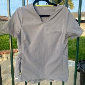 MEDELITA Scrub top . Mint condition. Inner collar fluorescent yellow trim.